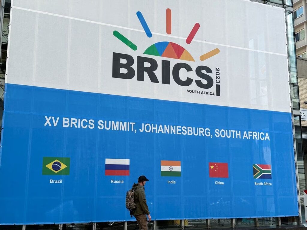 A person walks past the Sandton Convention Centre, which will host the upcoming BRICS Summit, in Johannesburg, South Africa August 19, 2023. REUTERS/James Oatway/File Photo